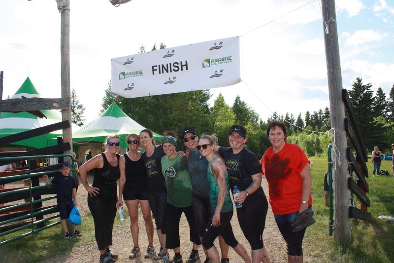 Some of the Farmer’s Filthy 5 organizers posed for a photo with friends after completing the obstacle race. From left, were: Rianna Westerlund, Reagan Foster, Jaime Johnson, Robyn Holodniuk, Jennifer Lindgren, Allison Stewart, Nicole Korpusik and Trudy Scebenski.
