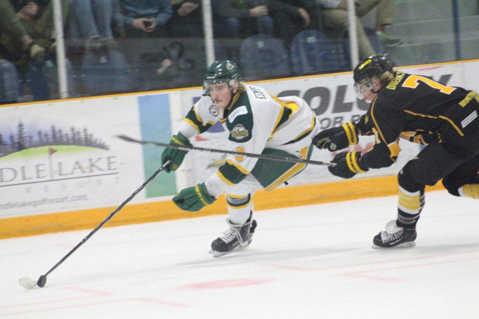 Luke Kempf tries to blow past a Nipawin Hawks defender during a playoff game earlier this season. Kempf’s grit and determination were big selling points to 鶹Ƶern Alberta Institute of Technology where Kempf will be playing hockey next season. photo by Christopher Lee