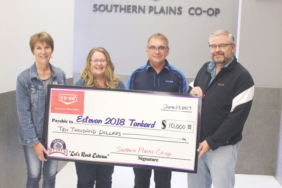 1) From the left, 2018 SaskTel Tankard sponsorship committee member Sheila McGillicky, Estevan Curling Club manager Pauline Ziehl Grimsrud, Southern Plains Co-op general manager Brian Enns and co-op board chair Robert Grimsrud participated in the cheque presentation.