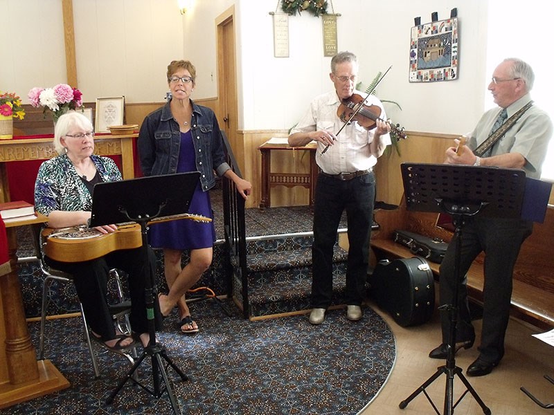 United Church singers on June 25 - Gayle Wensley, Pam Pidwerbesky, Ed Neufeld and Russ Fountain.