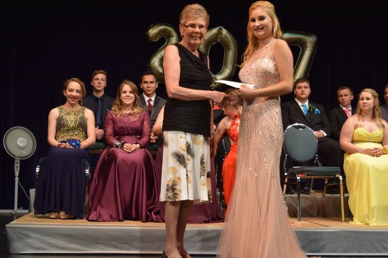 Bernice Wilgosh presented Hannah Scherban with the Canora Lioness scholarship. Scherban also received the Beta Sigma Phi scholarship, the Canadian Imperial Bank of Commerce (CIBC) scholarship, the Canora Economic Development scholarship, the Community Insurance scholarship and the Gateway Co-op scholarship.
