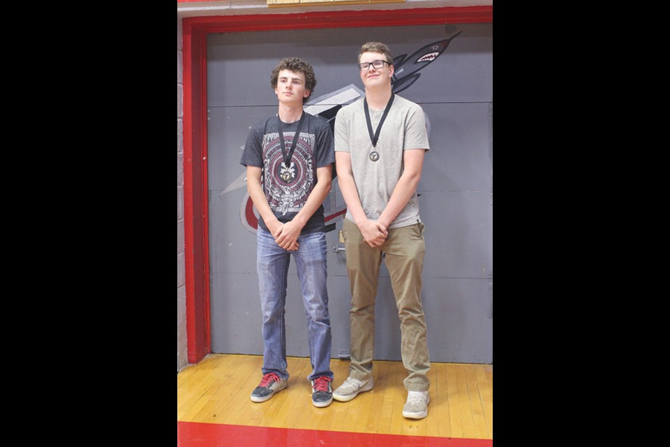 Golf award
Johnathan Harder and Conner Gronsdahl received the golf scholarship for their promising play during the past golf season.
