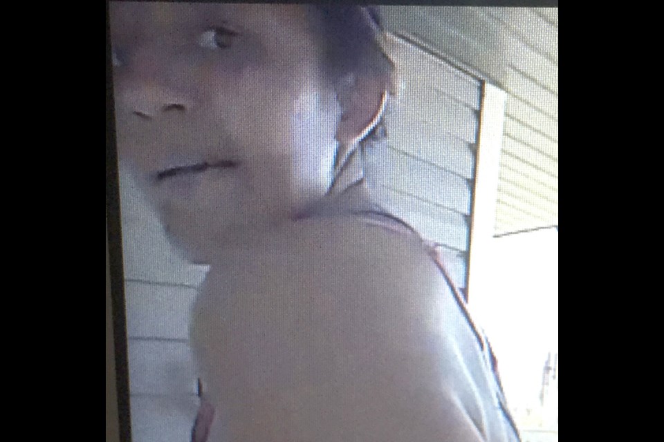 A person of interest in a break and enter to a residence who has not yet been identified on July 30.