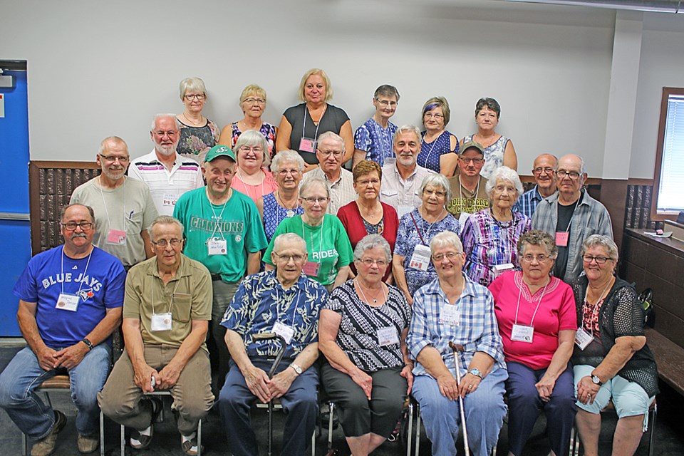 Former students of Newfield School pose for a group photo at the Wapiti Valley Country Reunion, held at the Codette Community Centre July 28 to 30. Review Photo/Devan C. Tasa.