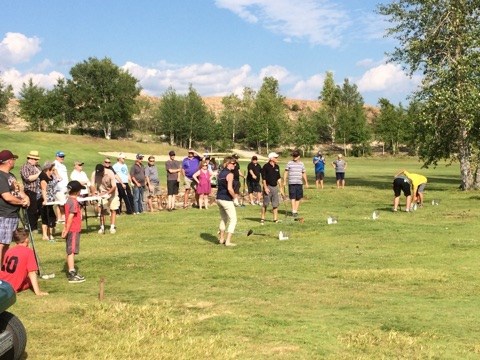 Competitors take part in the CFAR Million Dollar Hole in One event at the Phantom Lake Golf Club.