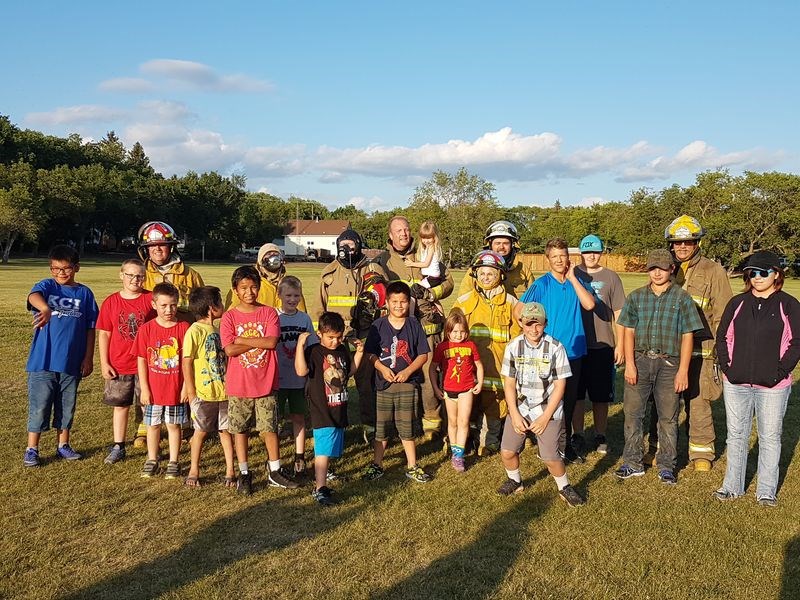 Members of the Kamsack Volunteer Fire Department assembled on the field with the opposing team after a 20-minute soccer game. Although the firefighters lost by a score of 7-0, they felt the game was a success, said Ken Thompson, deputy fire chief, who has some 20 years experience as a firefighter. “Some of our newer members have not experienced the heat and stress involved in working a real fire,” he said. “This game gave them a real idea of working under stress. Two players experienced running out of air during the game.”