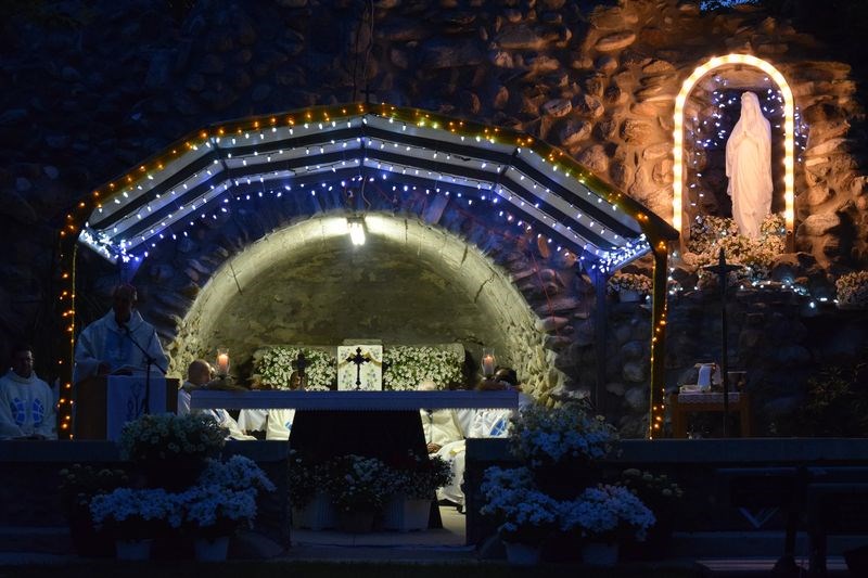 The Grotto of Our Lady of Lourdes was lit up for evening mass at the annual Rama Pilgrimage, commemorating the 100th anniversary of Our Lady of Fatima in Portugal.