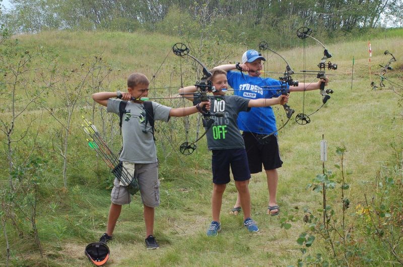 Young shooter on the 3D archery shoot course from left, were: Cole Masley, Trae Peterson and Mason Babiuk.