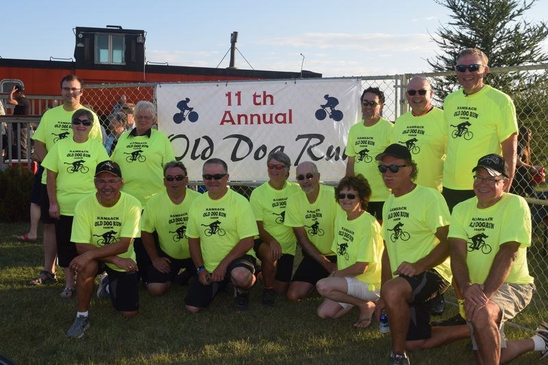 Among the cyclists and support volunteers who participated in the 11th annual Old Dog Run, from left, were: (standing) Stephen Kozakewich, Maureen Maksymetz, Maria van As, Ken Achtymichuk, Warren Popick of Yorkton and Right Rev. Robert Hardwick, (and kneeling) Joe Kozakewich, Harold Maksymetz, Greg Nichol, Brenda Summers, Warren Summers, Debbie Kozakewich, Jim Nahnybida and Tom Campbell.