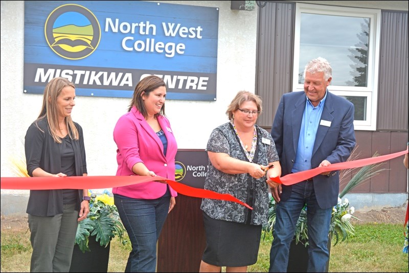 Tanis Studney, Tavia Laliberte, Melanie Roberts and Ken Hodgson cut the ribbon to introduce the new facility.