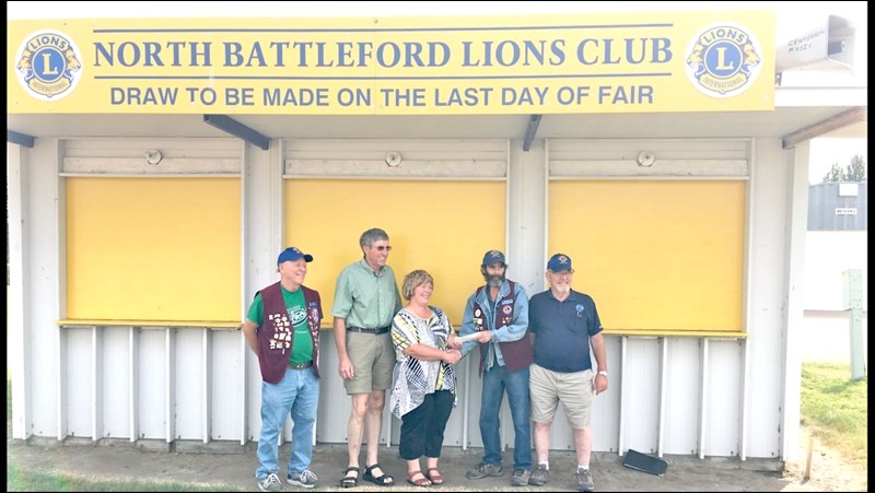 Left to right are club secretary Harold Bishop, winners of $5,000 first prize Doug and Jean Brehon of Maymont, cash draw chairman Rod Russell and club president Gord Mullet. The draw was made Aug. 18.