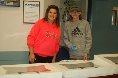 Rachel Kashuba, left, and her son Brady sold cookies at the Sturgis Kinette Fall Market.