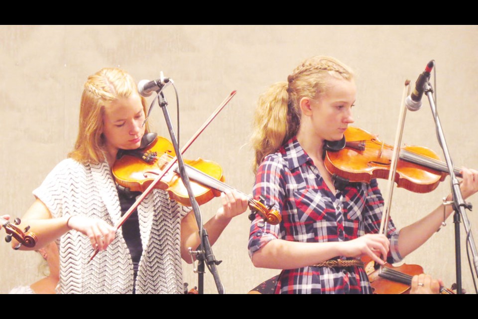 Jenelle Breault, left, and Micah Walbaum performed at a fundraising dance in Corning on Saturday. Photo submitted