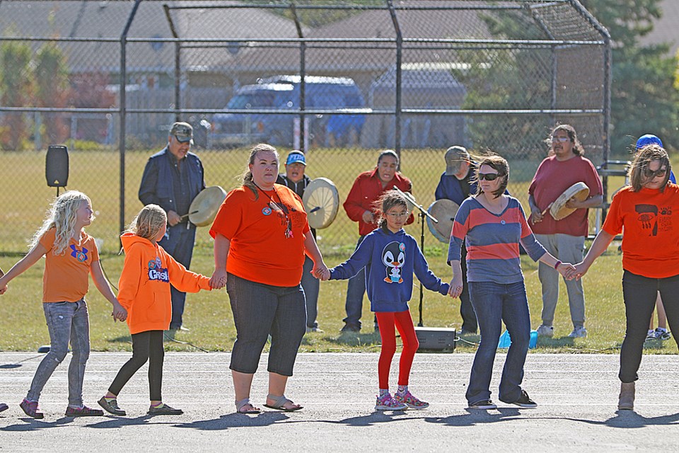 In Melfort to observe Orange Shirt Day Sept. 29, people gathered at the Cumberland College campus to remember victims and survivors of residential schools while participating in a round dance. Review Photo/Devan C. Tasa