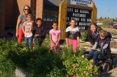 The Preeceville garden club harvested the remaining vegetables from the school’s community garden. From left, were: Megan Maier, Ally Apland, Jian Isican, Marie Anguluan, Quirin Nelson, Kim and Ian Sandager.