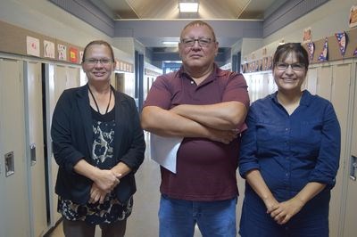 Working at Keeseekoose Chiefs Education Centre this year with Richard Fiddler, principal, are Cheryl Quewezance, left, the Nākawē teacher, and Angela Powder, who is teaching the adult basic education course to 13 students.