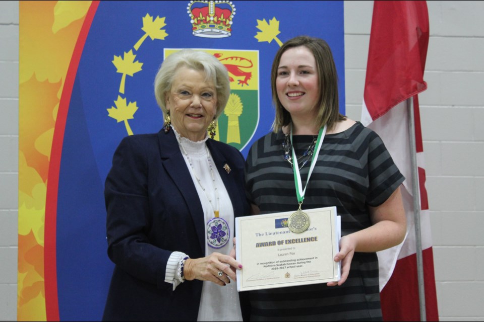 Saskatchewan Lieutenant Governor Vaughn Solomon Schofield presents Creighton Community School student Lauren Fox with the Lieutenant Governor’s Award of Excellence during a ceremony at the school on Oct. 17. - PHOTO BY ERIC WESTHAVER