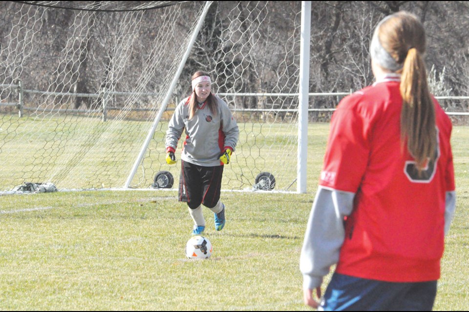 ECS goalkeeper Jessica Shebaylo-Lajoie readies herself and her team for a goal kick Friday against Swift Current.