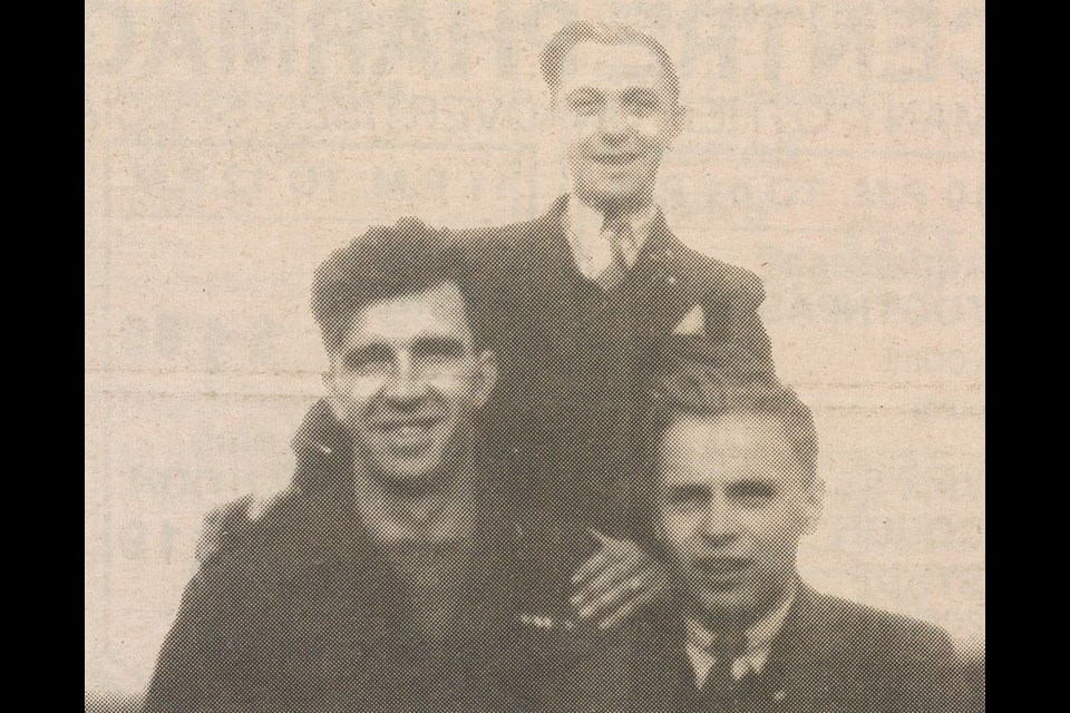 After VE-Day, Lukinuk’s regiment was moved back into friendly territory in Holland. While in Lanturan, he was billeted with the Bosch family and his new tour guide was Henry Bosch (centre) with whom he kept contact for many years after the war. At right is one of Bosch’s friends. This photo was taken on top of a fire tower.
