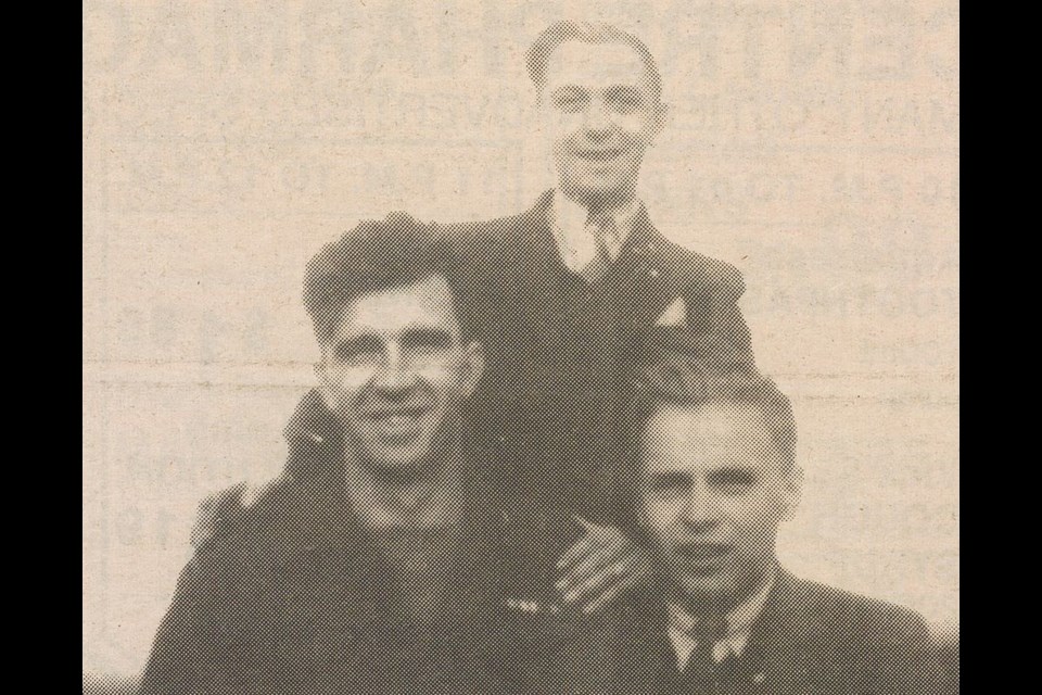 After VE-Day, Lukinuk’s regiment was moved back into friendly territory in Holland. While in Lanturan, he was billeted with the Bosch family and his new tour guide was Henry Bosch (centre) with whom he kept contact for many years after the war. At right is one of Bosch’s friends. This photo was taken on top of a fire tower.