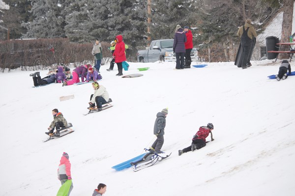 It may have been cloudy, but it wasn’t too cold or windy over the weekend, and that meant a great opportunity for those wanting to get in some early sledding at Rodney Ridge in the city thanks to the presence of the early winter season snow cover, and many were out on the hill Sunday afternoon.