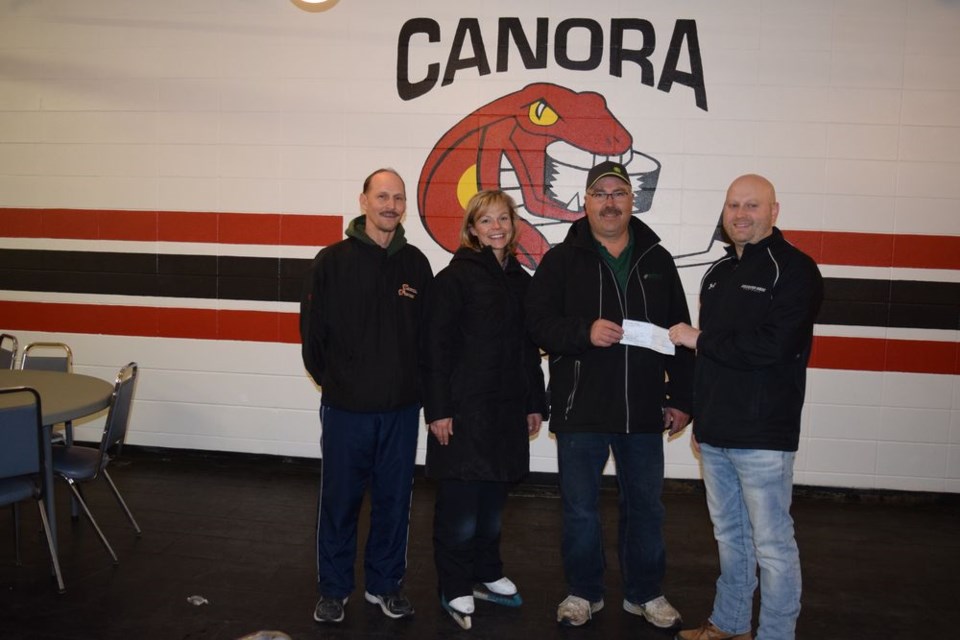 The Canora Minor Hockey Association, the Canora Skating Club, and the Canora Flames Hockey Club donated a total of $7,500 toward painting the lobby of the Canora Civic Centre. From left, are: James Trofimenkoff, Flames’ treasurer; Leona Kitchen, skating club coach; Kelly Beblow, minor hockey president; and Aaron Herriges, Canora director of leisure services; who accepted the donation of behalf of the Town of Canora.