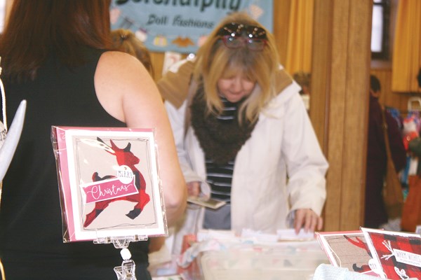Customers perused the wide selection of cards, designs, and other crafts at the Three Wise Women event.