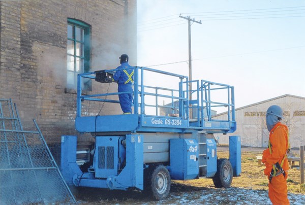 Workers used steam to blasted the graffiti away.