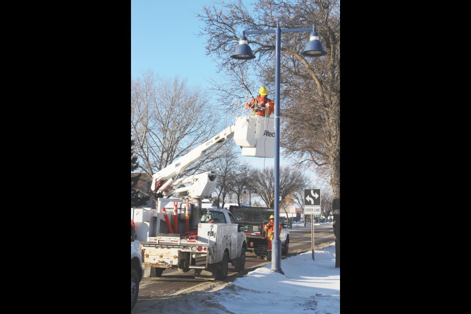 Christmas is a little over a month away, and that means many people across Yorkton are decorating for the holiday. That includes the City of Yorkton itself, which was putting up its own Christmas lights on November 17, hanging snowflakes on light standards down Broadway.