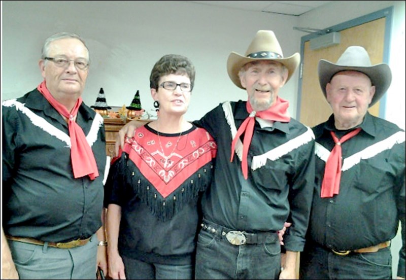 Gerry Kobelsky, Thelma Boychuk, Jon Sloan and Frosty Schneider at Poplar Courts in Wilkie.