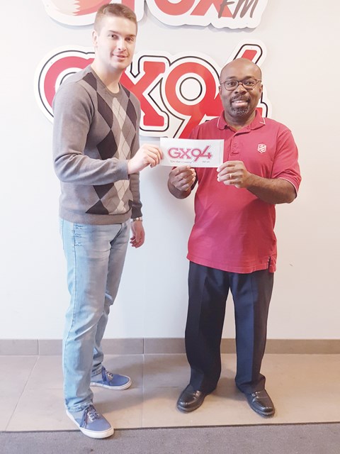 A $1000.00 donation from the proceeds of the sales of the GX94 Christmas Goodies Cookbook was recently presented to the Yorkton Salvation Army. Here GX94 mid-day announcer Nick Kaczmar makes the presentation to Salvation Army Lieutenant Samuel Tim.