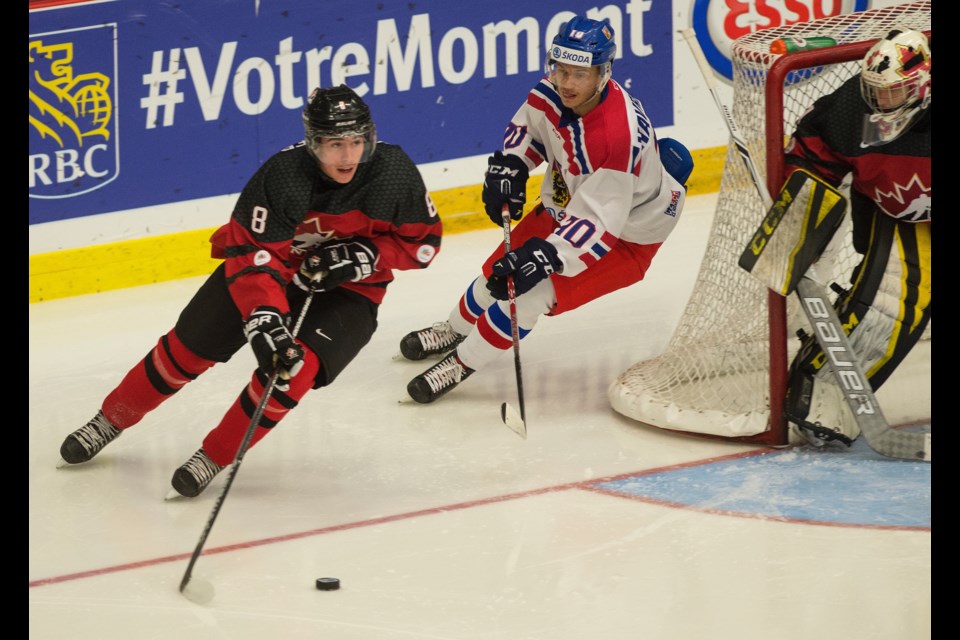 Levi Kleiboer skated away from a member of the Czech Republic during the World Junior A Challenge in Truro, N.S. last week. Photo submitted