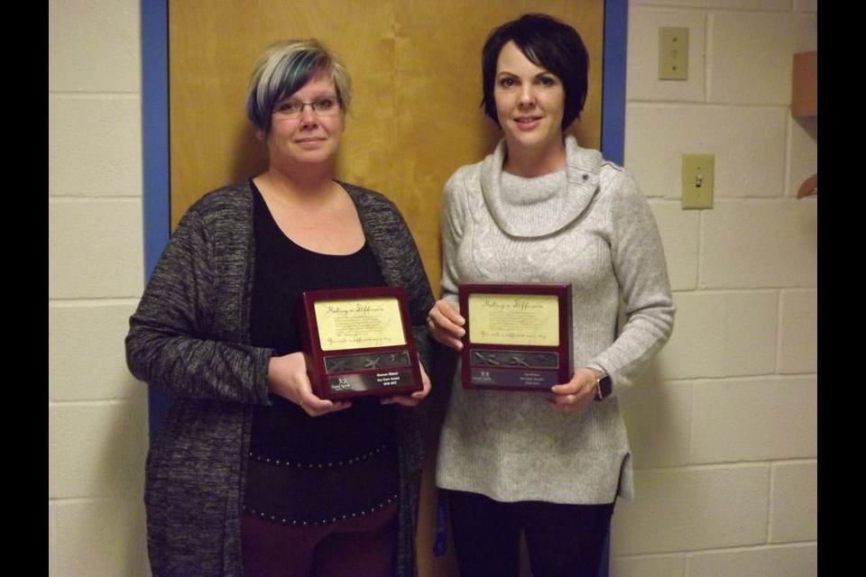 Recipients of Sea Star awards at the KCI are: Shannon Bielecki, left, and Lee Bowes.