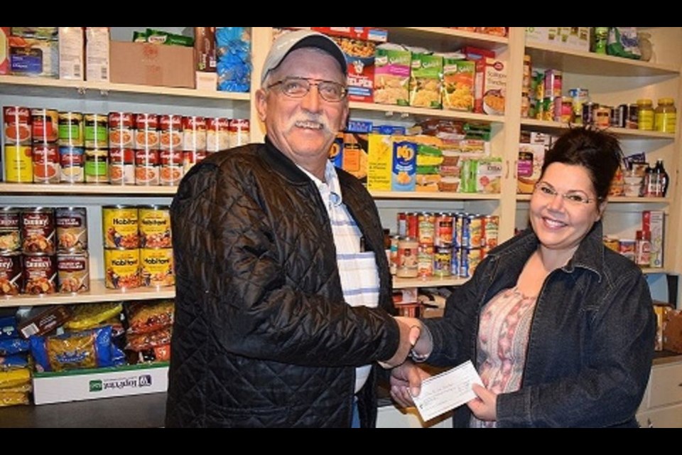 On December 14, the Canora Ag Society donated just over $1,625, the proceeds of a steer purchased by the group at the Yorkton Regional 4-H Show and Sale, to Canora’s Filling the Gap Food Bank. Ivan Olynyk, Ag Society director, made the presentation to Pastor Mavis Watson of the food bank.