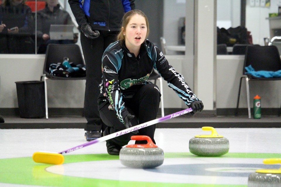 Kelsey Sommerfeld gives direction to her sweepers during the Saskatchewan Winter Games Rivers West district qualifier girls' final Sunday at the Twin Rivers Curling Club. Photo by Lucas Punkari
