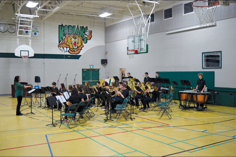 Kim Jones conducted the Creighton Community School grades 6 to 10 band during its winter concert on Jan. 16. The band was joined by the school’s choir for part of the performance. - SUBMITTED PHOTO