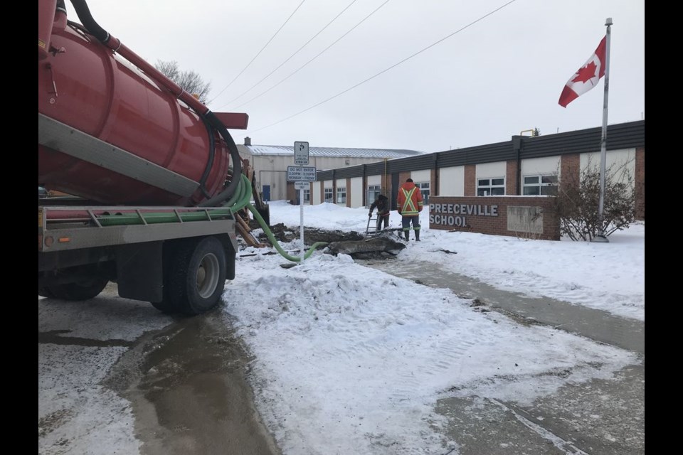 Chris Halkyard, left, and Blaine Hort oversaw the water main break at the Preeceville School on January 25.