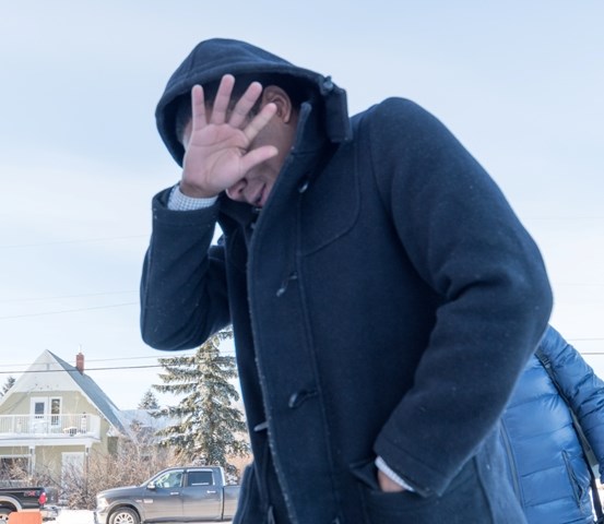 Witness Eric Meechance arrives at the courthouse.