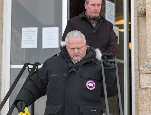 Defense lawyer Scott Spencer and Gerald Stanley leave the courthouse at the end of the fourth day of the trial.