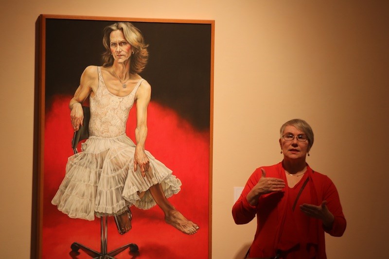 Artist Iris Hauser and her portrait "The Changeling."