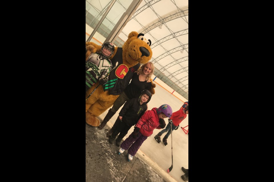 Manor Skate-a-thon was a big success on Monday, Feb. 19. Presley Onufreychuk (third from right) wanted to host a fun day for youth while giving back to the community. Here she stands with a few youngsters enjoying the day and Cooper from the Southern Plains Co-op, which was a big supporter throughout the day.