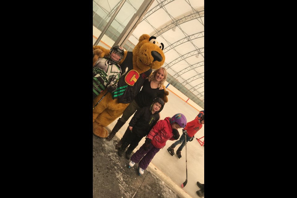 Manor Skate-a-thon was a big success on Monday, Feb. 19. Presley Onufreychuk (third from right) wanted to host a fun day for youth while giving back to the community. Here she stands with a few youngsters enjoying the day and Cooper from the Southern Plains Co-op, which was a big supporter throughout the day.