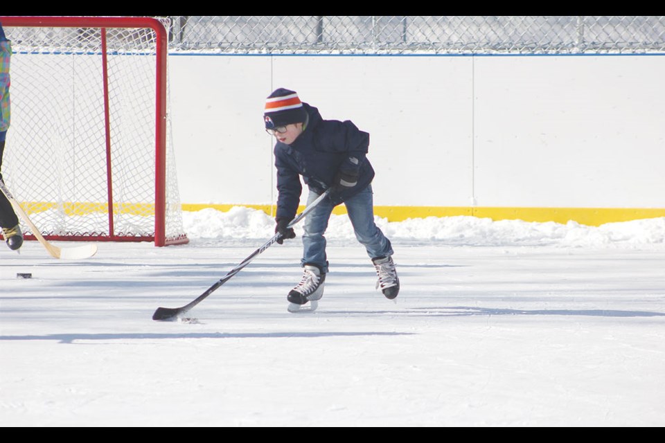 Katie Sauder works on her puckhandling skills at the outdoor arena in the Kin Play Park.