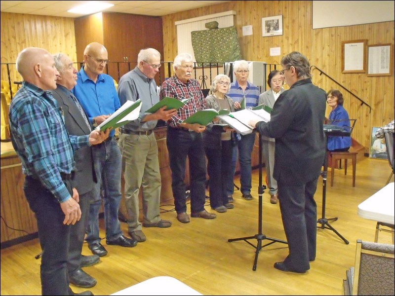 Borden Friendship Singers, Stephen Derbawka, Wendell Dyck, Delmar Hamm, Archie Wainwright, Ruben Rempel, Helen Sutherland, Miriam Hamm, Lily (Radisson Cafe), Sheila Block at the piano and Marlene Derbawka directing. Photos by Lorraine Olinyk