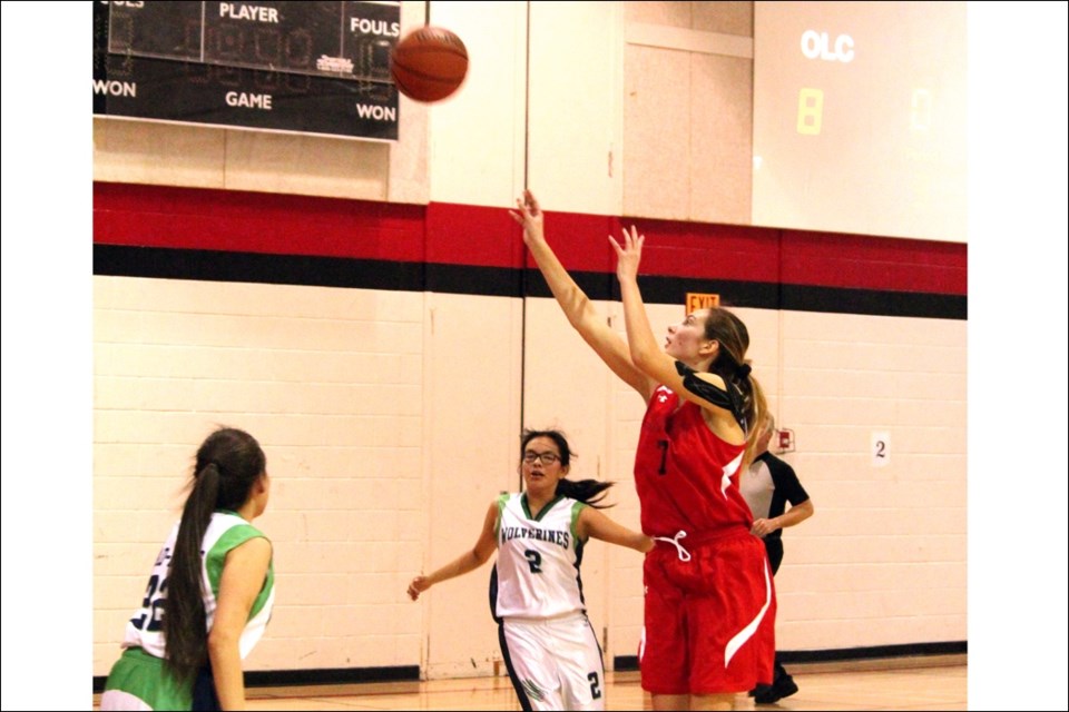 Destinee Lahonen puts up a shot against Oscar Lathlin Collegiate during senior varsity basketball zones last weekend. Lahonen and the senior Hapnot Kweens won the Zone 11 banner in the tournament, beating Oscar Lathlin in the tournament final. - PHOTO BY CYNTHIA BIGRIGG