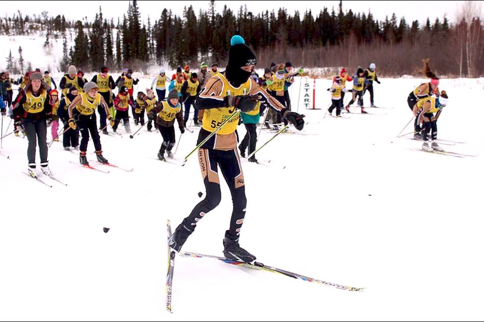 Graydon Bedford leads the pack shortly after the mass start at 2 pm sharp. - PHOTO BY ERIC WESTHAVER