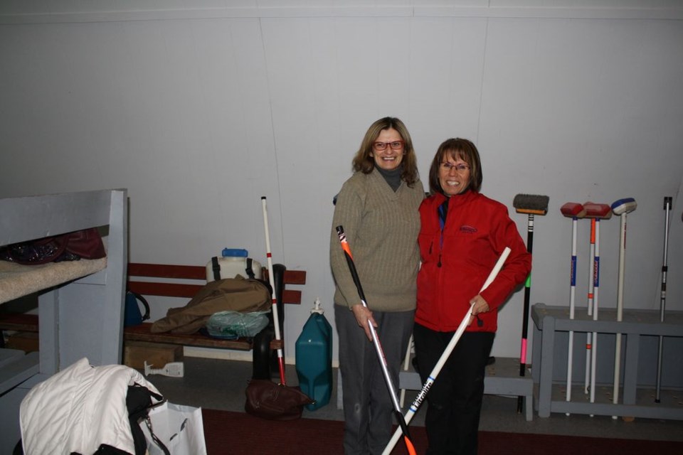 Joanne Boechler, left and Laura Pasiechnik, right, were the winners of the Endeavour two-on-two bonspiel from February 14-16.