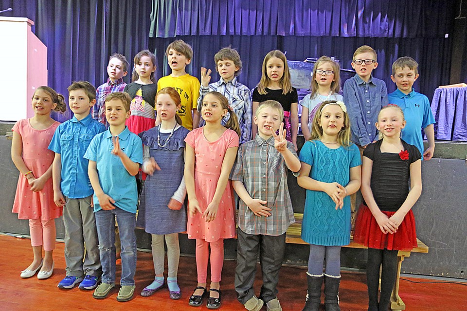 The Grade 2 class of Cathie Nakonechny at Central Park Elementary recited The Creature in the Classroom. Review Photo/Devan C. Tasa