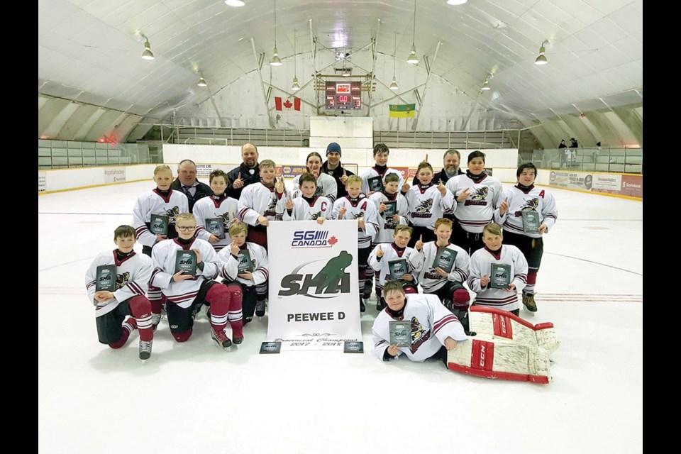 Wynyard Monarchs peewee hockey team - Provincial champions. Pictured (L to R) Back Row: Ryan Bodnarchuk, Greg Gudjonson, Dean Kletzel, James Neal, and Jeff Fisher. Middle Row: Triston Panchuk, Danny Babut, Tyler Gudjonson, Kiyra Kletzel, Evan Fisher, Gage Joynt, Rylan Stadnyk, Luke Prisiak, Troy Linklater, and Tucker Stefanik. Front Row: Matthew Jackson, Benjamin Heuchert, Denton Bowen, Gavin Bodnarchuk, Jack Chorney, Spencer Bencharski, and Dalyn Chuckry. photo courtesy of Suzanne Gudjonson