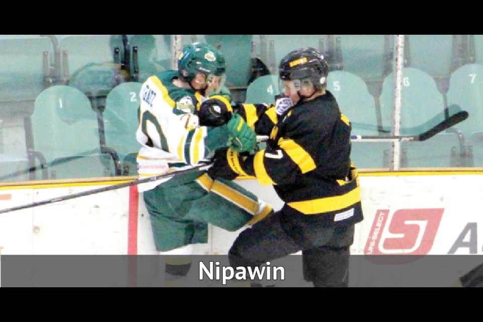 Nipawin Hawks defenseman Carter Doerksen gets tangled up in the corner with Humboldt Broncos captain Logan Schatz during SJHL action in Humboldt earlier this year. Doerksen could be seeing a lot of Schatz over the next two plus weeks as the two clubs get set to renew acquaintances. The SJHL semi-final series will be a rematch of last year's first round playoff series, which the Hawks won 4-0. Humboldt Journal Photo/Christoper Lee